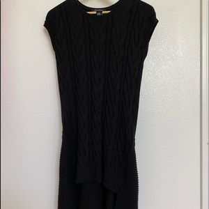 Black no sleeve sweater dress.